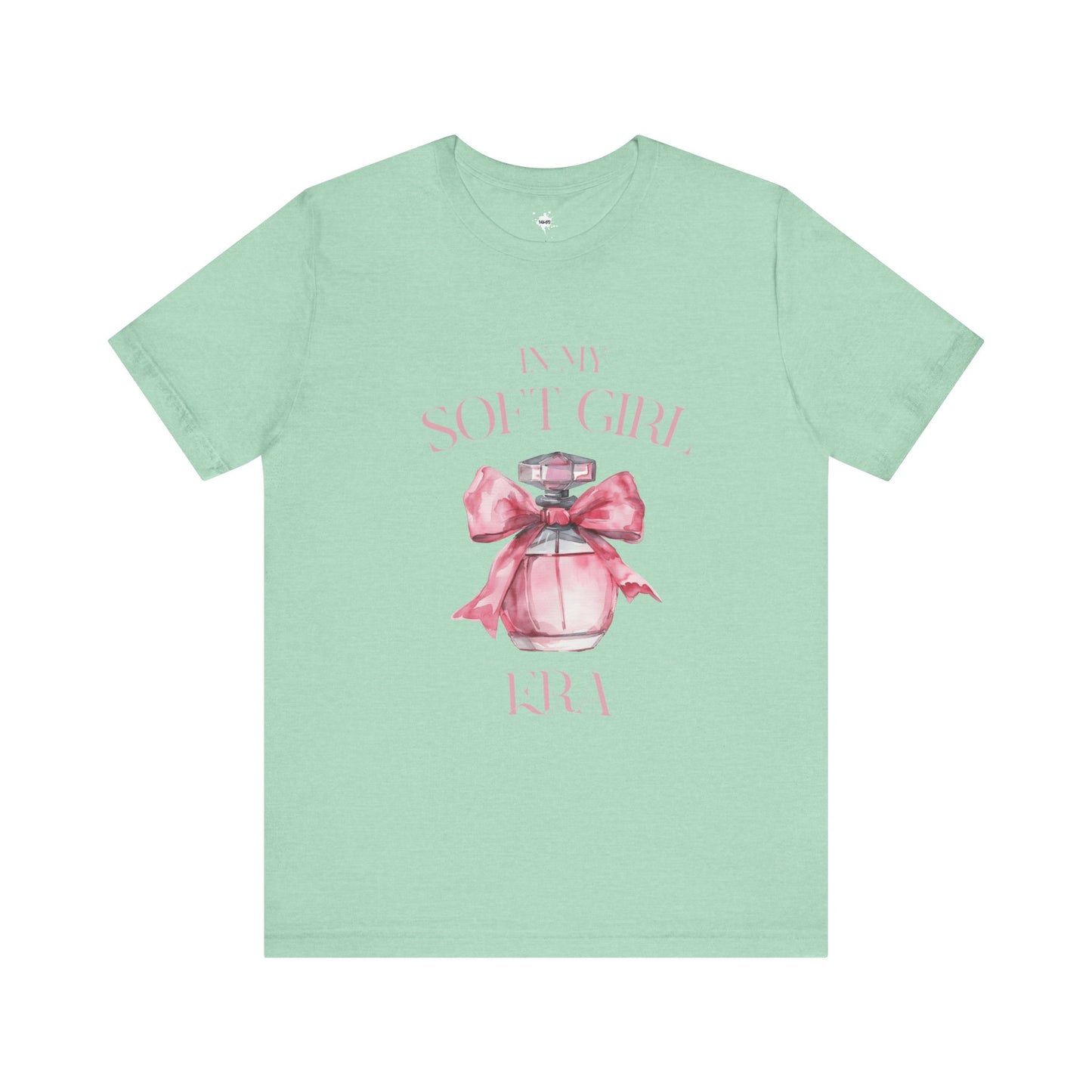 front of a mint green in my soft girl era t shirt with a pink perfume bottle with a pink bow