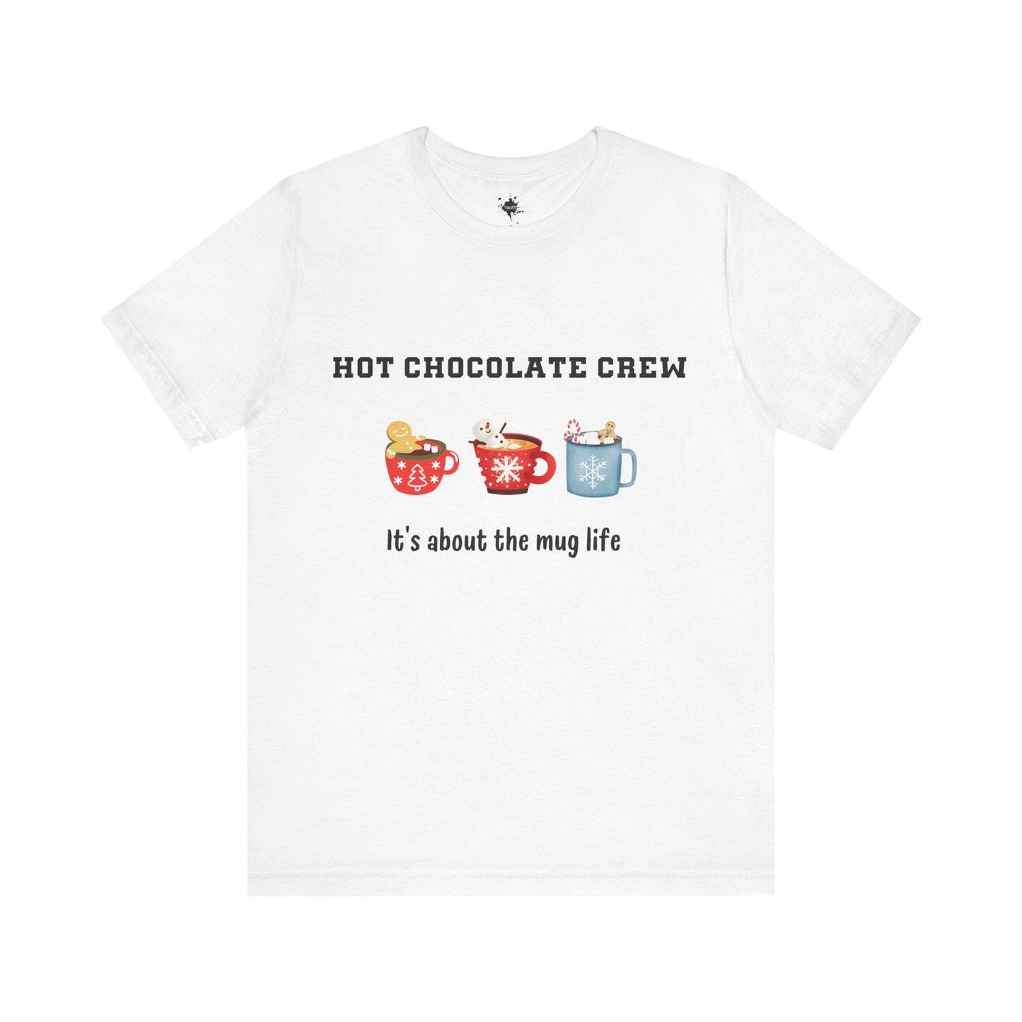 White t-shirt featuring three cups of hot chocolate and the phrase 'It's about the mug life,' perfect for cozy winter vibes and casual holiday style