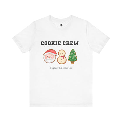 white front t shirt with cookie crew it's about the cookie like with a santa, snowman and christmas tree cookie image