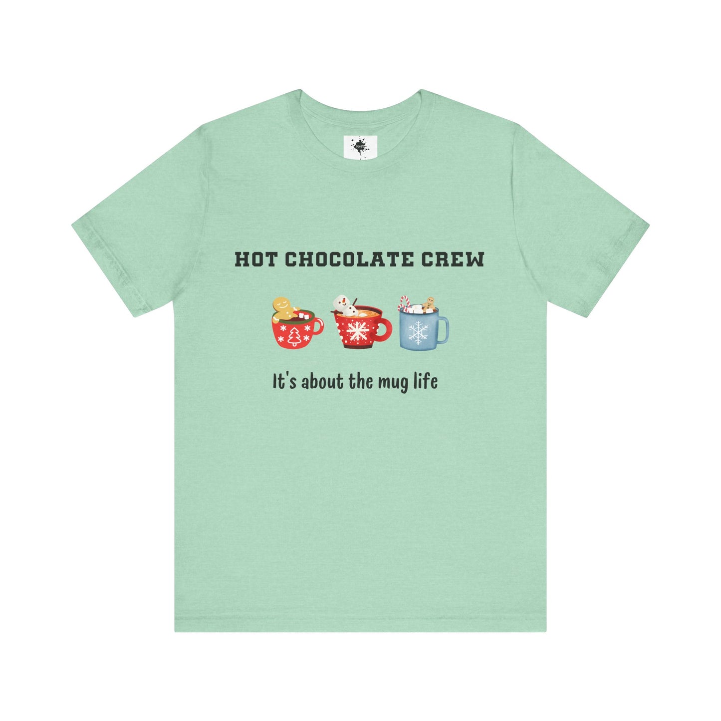 mint green t-shirt featuring three cups of hot chocolate and the phrase 'It's about the mug life,' perfect for cozy winter vibes and casual holiday style